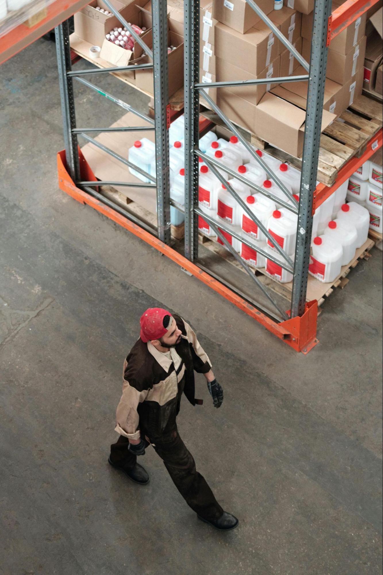 Man walking in a warehouse. 