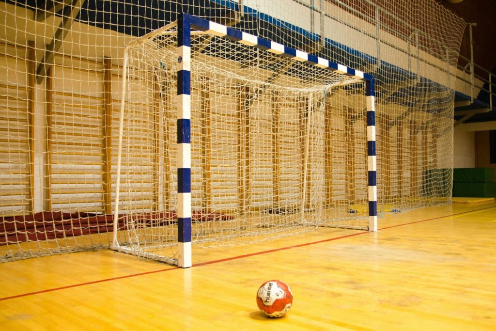 Soccer net and ball in an indoor gym