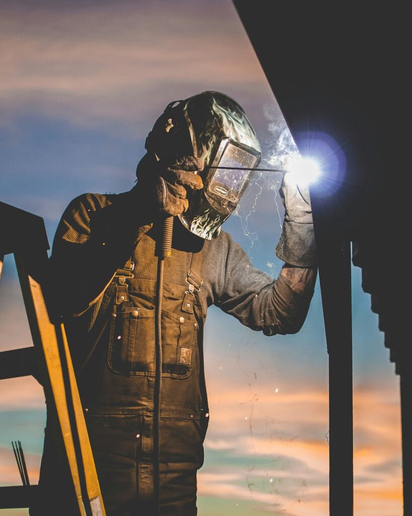 Welder working on a construction site.